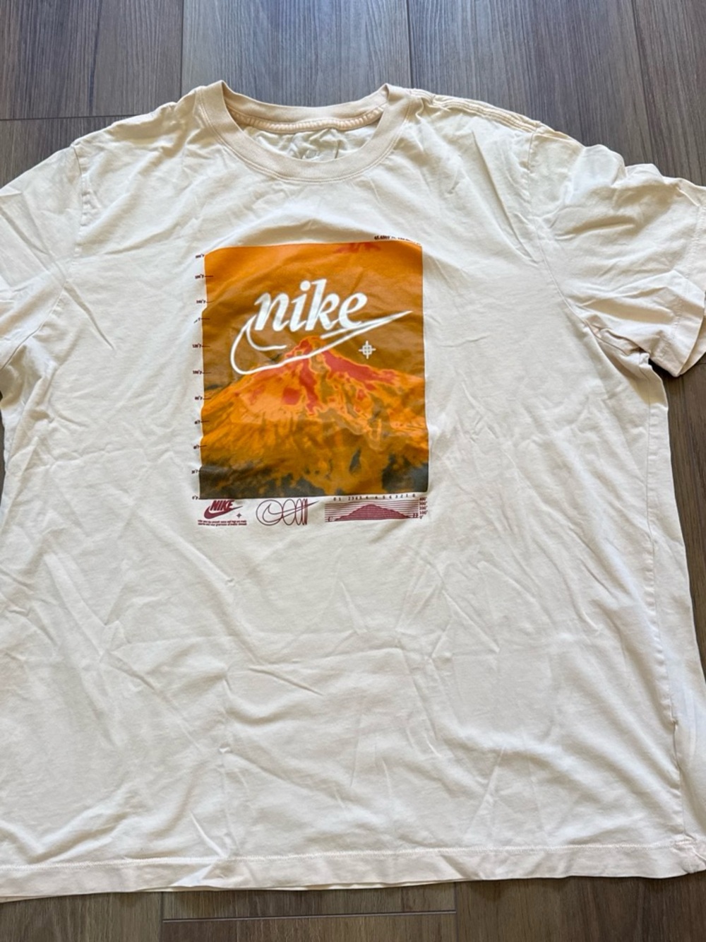 Nike off white Short Sleeve Tee with Orange Mountain Graphic